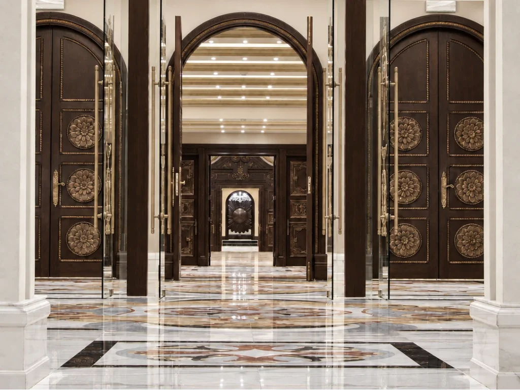Villa W, Lebanon — arched timber doors and marble hall