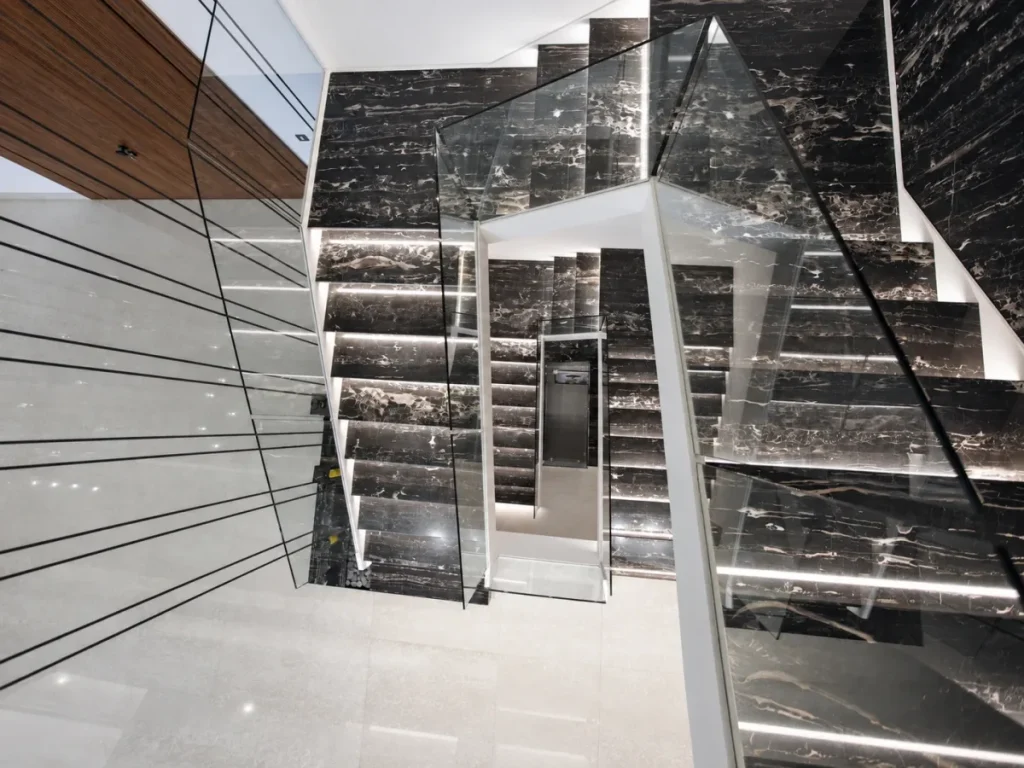 Villa Z, Dubai — marble and glass staircase